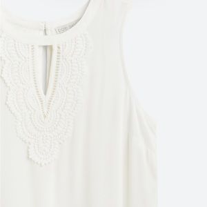 Never been worn sleeveless blouse.